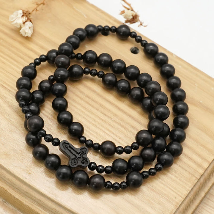 Crucifix of 6*8 mm Round Black Sandalwood Nylon Cord Rosary