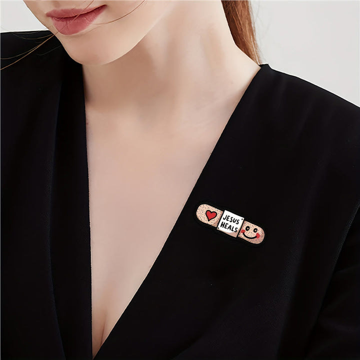 Christianartworkshop "Jesus ​​Heals" Acrylic Heart Band-Aid Brooch: A Symbol of Faith and Comfort - image 1