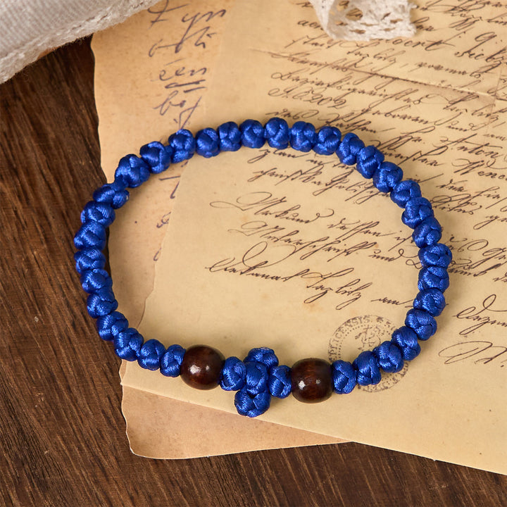 Christianartworkshop Blue & Black Cross - Knot String Bracelet: A Token of Faith - Blue - image 0