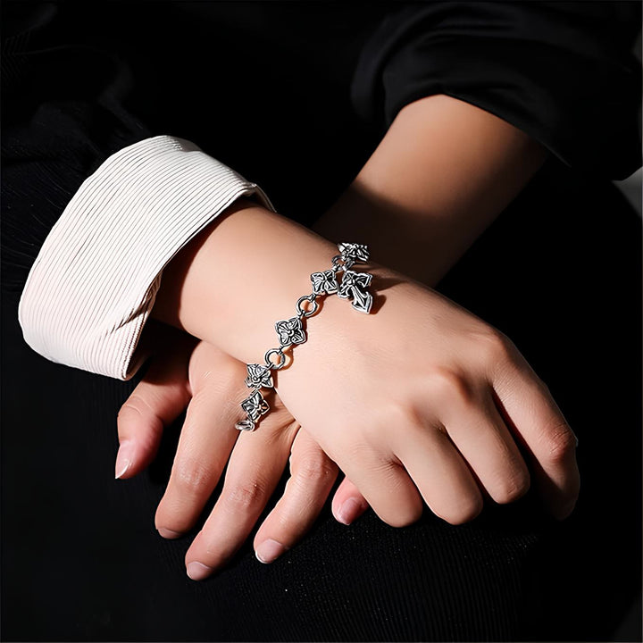 Christianartworkshop Retro - Styled Sterling Silver Cross Bracelet with Floral Motifs: A Nostalgic Sign of Faith - image 1