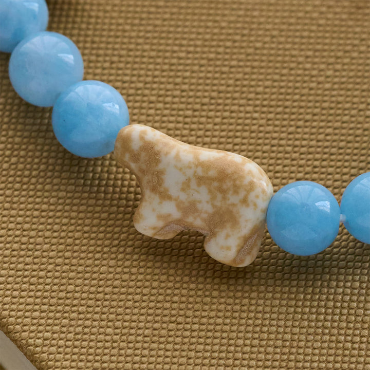 Christianartworkshop Blue Bead Polar Bear Handmade Cross Bracelet: Save Our Polar Bears - image 4