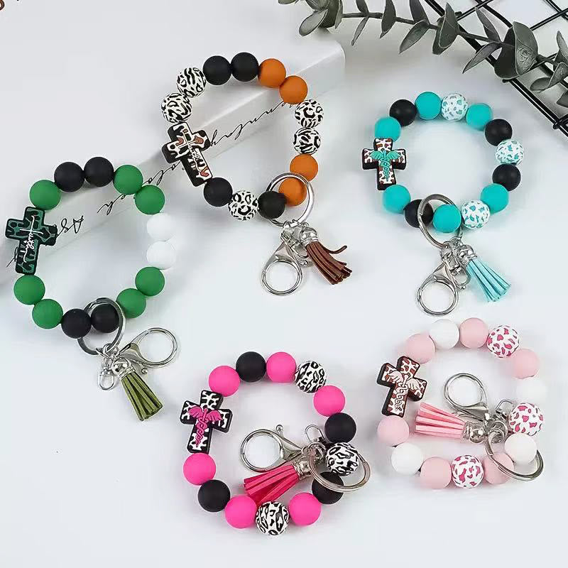 Christianartworkshop Rosary Keychain with Silicone Cross Charm & Leopard-Print Wooden Beads: Portable Devotion on the Go - image 1