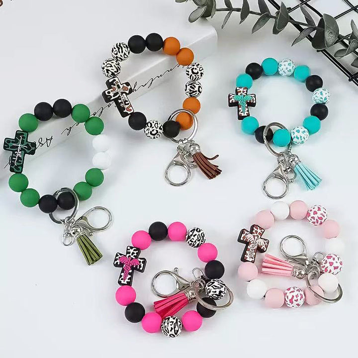 Christianartworkshop Rosary Keychain with Silicone Cross Charm & Leopard-Print Wooden Beads: Portable Devotion on the Go - image 1