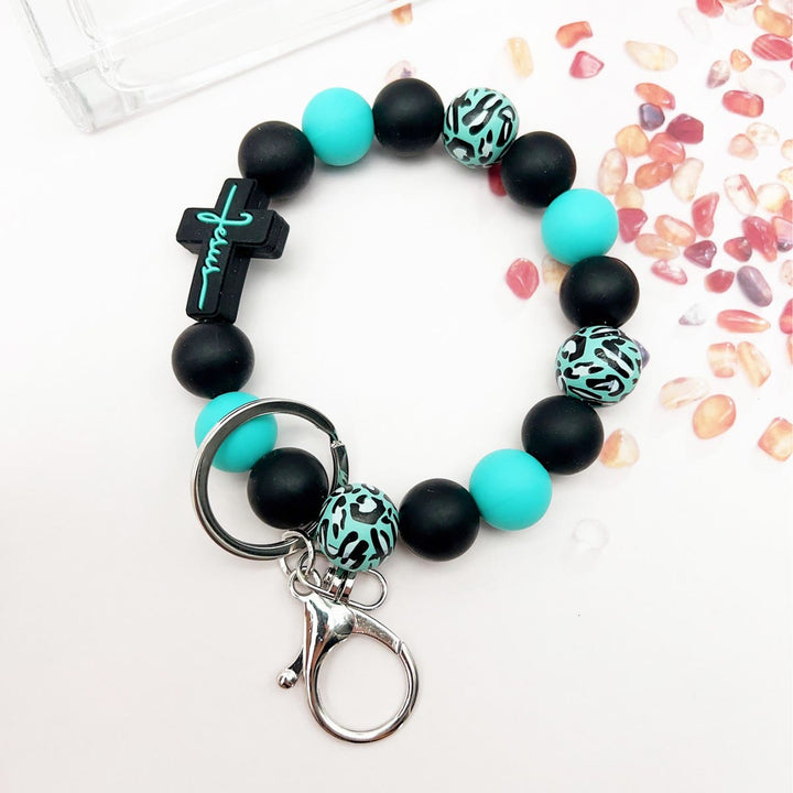 Christianartworkshop Rosary Keychain with Silicone Cross Charm & Leopard-Print Wooden Beads: Portable Devotion on the Go - Black - image 0